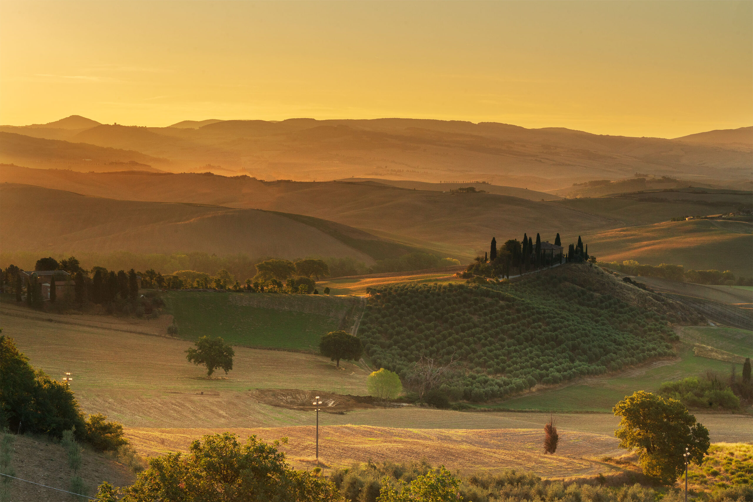 hilly landscape at sunset